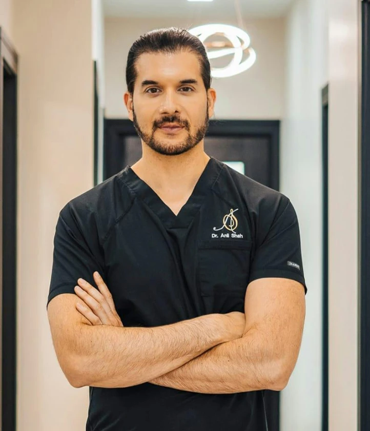 dr anil shah arms crossed