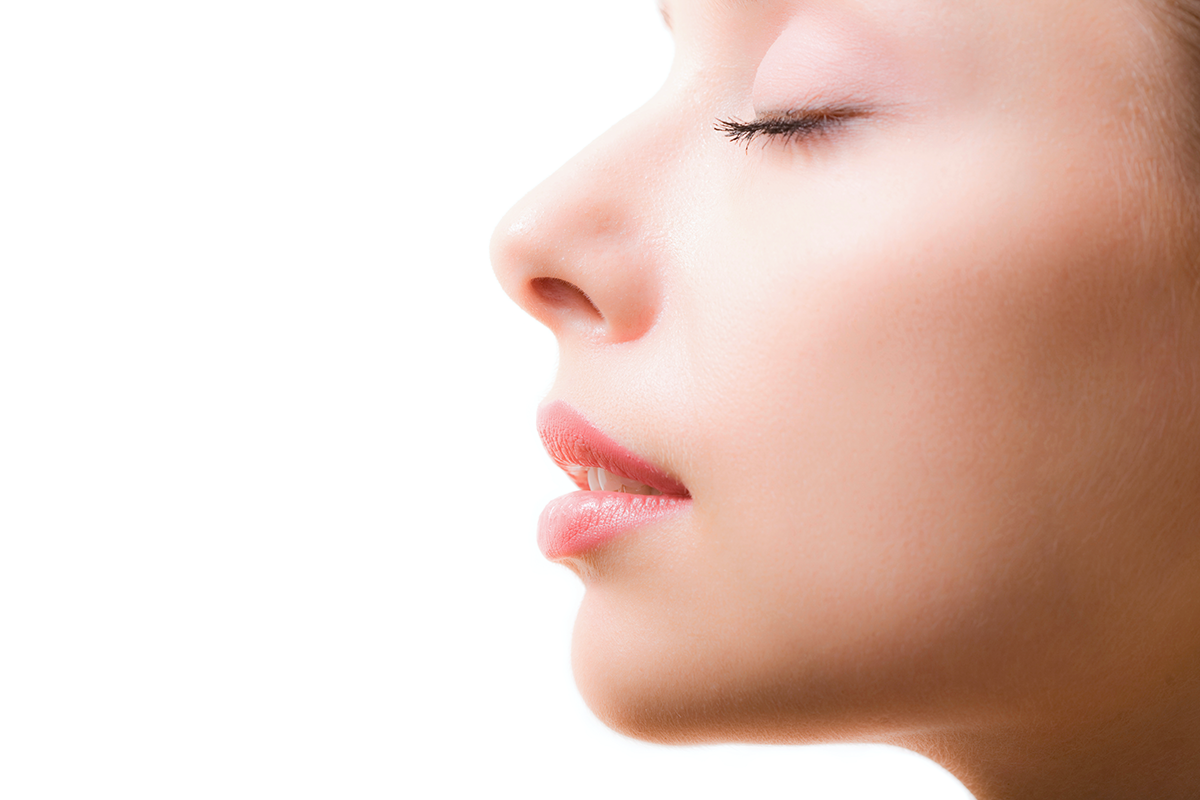 feminine face with closed eyes and make up