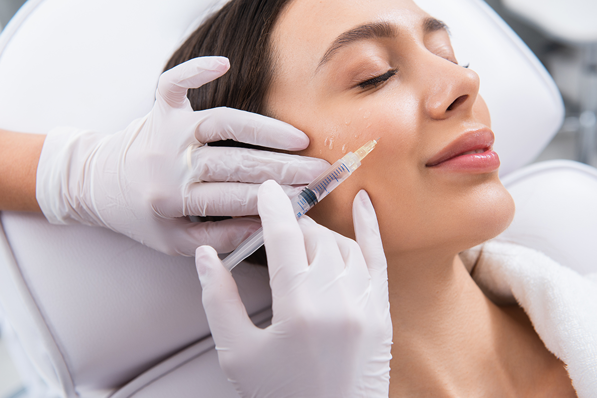 happy lady on procedure of cheek zone