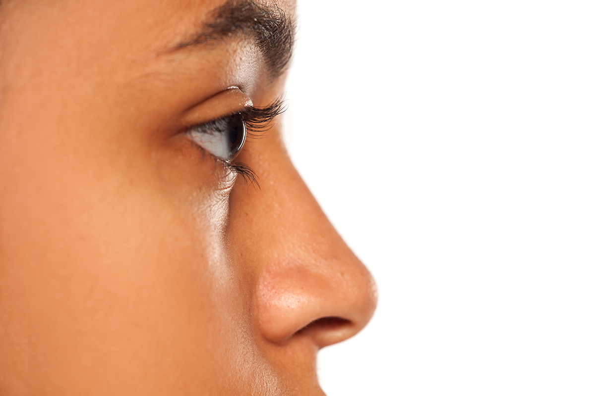 nose and eye without makeup of dark skinned female