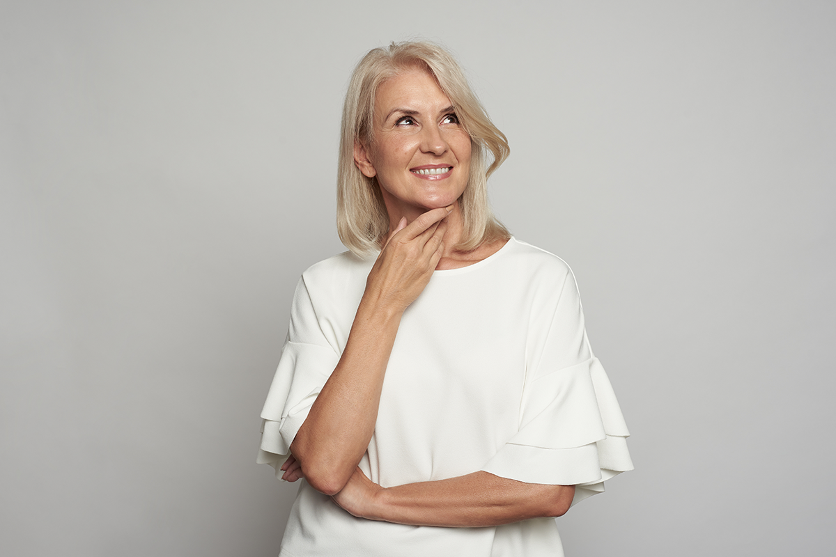 portrait of a beautiful 50 years old woman is smiling