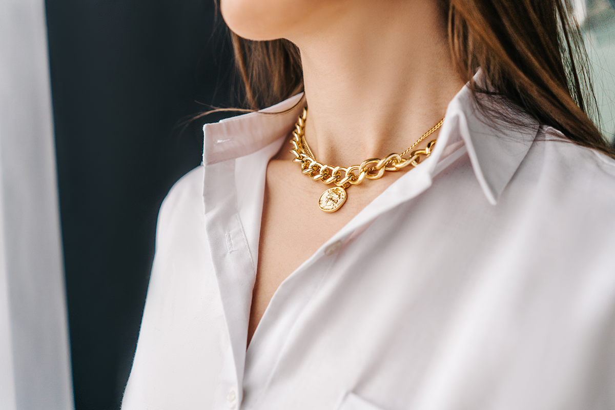 silver bijouterie chain on woman neck